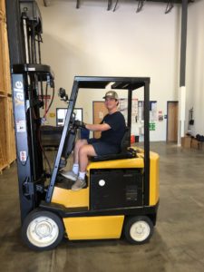 moving professional operating forklift